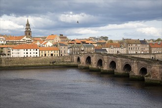 Historic stone bridge crossing River Tweed, Berwick-upon-Tweed, Northumberland, England, UK