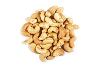 Pile of sweet cashew nuts isolated on white background. Top view