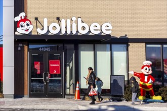 Sterling Heights, Michigan, Workers serve up Chickenjoy fried chicken at Jollibee, a Filipino fast