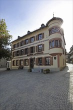 Historic Mohren Pharmacy built 17th century in backlight, building with corner turrets, turrets,