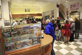 Customers inside baker confectionery shop, La Mallorquina, Calle Mayor, Madrid, Spain, Europe