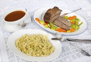 Swabian cuisine, roast beef, roast ox, herb spaetzle, meat dish, gravy, carrot vegetables, leek,