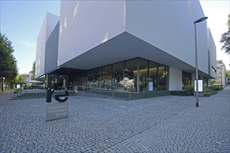 Museum Reinhard Ernst for abstract art by architect Fumihiko Maki, emblem, white modern building,