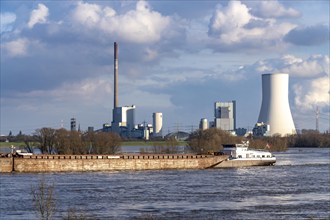 Cargo ships on the Rhine at Rheinberg, in the background the STEAG coal-fired power plant Duisburg