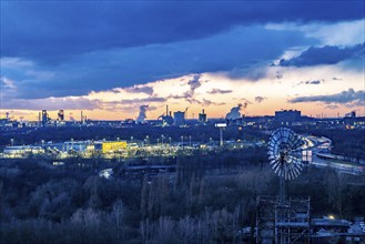 Skyline of the steel location Duisburg, Thyssenkrupp Steel Europe, in Duisburg-Bruckhausen, sunset,