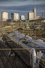 Train on the tracks west of Essen central station, city centre skyline, ICE and RRX, Rhine-Ruhr