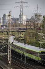 Flixtrain train on the railway line between Mülheim an der Ruhr, and Duisburg, busy railway line,