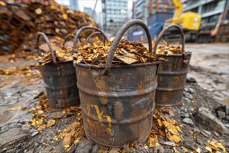 Scrap metal, in barrels in a scrap yard, recycling plant for metal utilisation, AI generated, AI