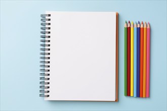 Empty blank notebook with colorful pencils. KI generiert, generiert, AI generated