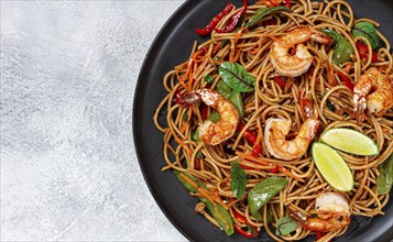 Fried udon noodles with shrimp and vegetables, Asian cuisine, homemade, no people