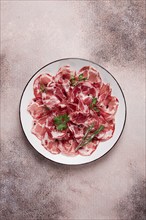 Sliced cured ham, prosciutto, italian dish, delicacy, parma ham, top view, no people