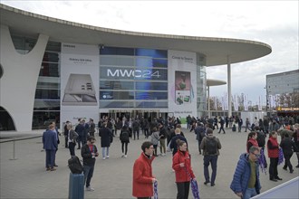 Visitors outside the exhibition centre, MWC Mobile World Congress 2024, Barcelona, Spain, Europe