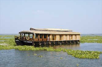 Traditional houseboat on Lake Vembanad, canal system of the backwaters, Kerala, India, Asia