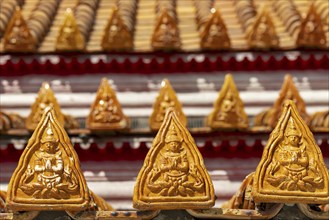 Roof decoration on the Uposatha Hall, Ubosot, the roof is staggered in three tiers and covered with