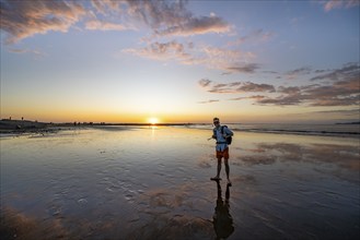 Evening mood, man at low tide on the beach, Marino Ballena National Park, Puntarenas Province, Osa,