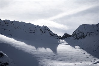 Hiker on hiking trail, snow-covered mountains, Ötztal, Tyrol, Austria, Europe