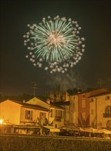 Fireworks from the Scaliger castle in the foreground Houses of, Borghetto, Valeggio sul Mincio,