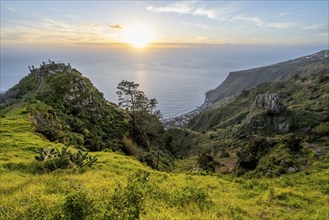 Evening mood, green coastal landscape on a steep cliff, sea and coast, viewpoint Miradouro da