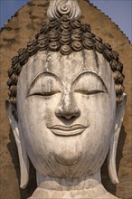 Buddha head in the central Buddhist temple Wat Mahathat, UNESCO World Heritage Sukhothai Historical