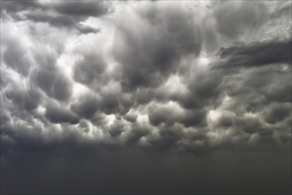 Gathering thunderclouds Clouds forming after storm warning Thunderstorm warning grey dark clouds