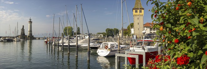 Harbour with Bavarian Lion, lighthouse and tower Mangturm, Lindau, Lake Constance, Bavaria,