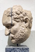 Carved Roman portrait head of a high ranking official, archaeology museum, Apollonia Archaeological