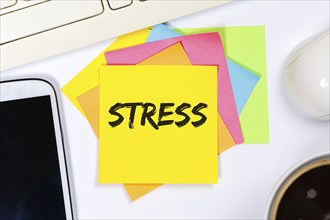 Stress at work burnout syndrome Relaxation Exhaustion as a business concept on desk in