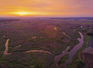 Sunrise over the meandering riverbed of the Narew and the Narew National Park, Narwianski Park