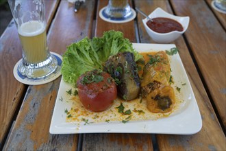 Armenian food, stuffed tomato and cabbage served in an Armenian garden restaurant, Bavaria,