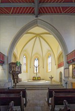 Pulpit, altar, crucifix and baptismal font, late Gothic Protestant-Lutheran town church of St