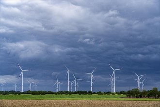 Wind farm east of Geilenkirchen, dark storm clouds, strong wind, North Rhine-Westphalia, Germany,
