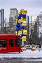 Winter in Frankfurt, euro sculpture at Willy-Brandt-Platz, snow-covered, Hesse, Germany, Europe