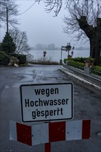 High water on the Rhine at Düsseldorf-Kaiserswerth, foggy weather, riverside paths and Rhine