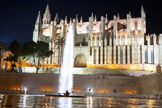 Palma de Majorca, Bay of Palma, the Cathedral of St Mary, kayakers in the lake in front of the