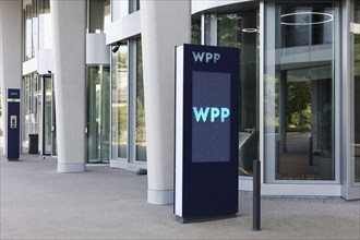 WPP Group office campus, logo in front of building, media and communications company, Düsseldorf