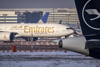 Aircraft on the taxiway at Frankfurt FRA airport, Fraport, in winter, Hesse, Germany, Europe