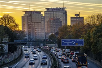 Evening traffic, partly with traffic jams, slow-moving traffic on the A40 motorway, Essen skyline,