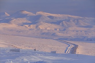 Road, gravel road, highway, icy, snowy, mountain landscape, morning light, Dempster Highway,