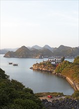 Cat Ba Island and the karst rocks of Lan Ha Bay in the evening light, Halong Bay, Vietnam, Asia