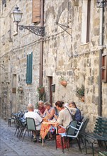 People in the historic centre of Bolsena, Lazio, Italy (for editorial use only)