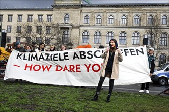 Luisa Neubauer speaks during a demonstration by Fridays for Future for compliance with climate