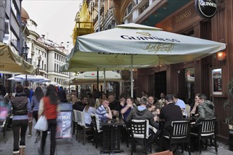 Bucharest, city centre, street scene in the historic old town, street cafes and restaurants,