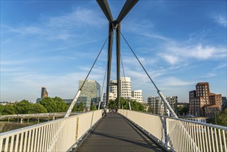 Bridge at the Media Harbour and the New Customs Yard with the Gehry buildings by architect and