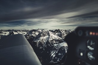 Flight over the late winter Lech Valley with a small aeroplane in Tyrol, Austria, Europe