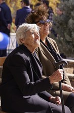 Survivors of the massacre of 3 June 1941, Two elderly woman with sunglasses enjoy the sunny weather