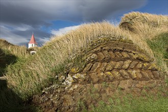 Grass sod houses and church tower, peat farm or peat museum Glaumbaer or Glaumbær, Skagafjörður,