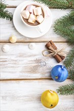 Christmas or New Year frame composition. Decorations, box, balls, cinnamon, ribbons, fir and spruce