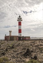 Red and white striped lighthouse, Faro de Toston, El Cotillo, Fuerteventura, Canary Islands, Spain,