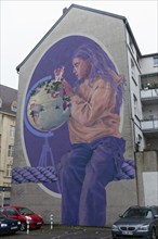 Mural, Girl with globe and compass, after a Gerhard Mercator portrait, mural by the artist duo