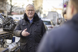 SPD parliamentary candidate Klaius Mindrup at a demonstration in Rykestraße against the decision of